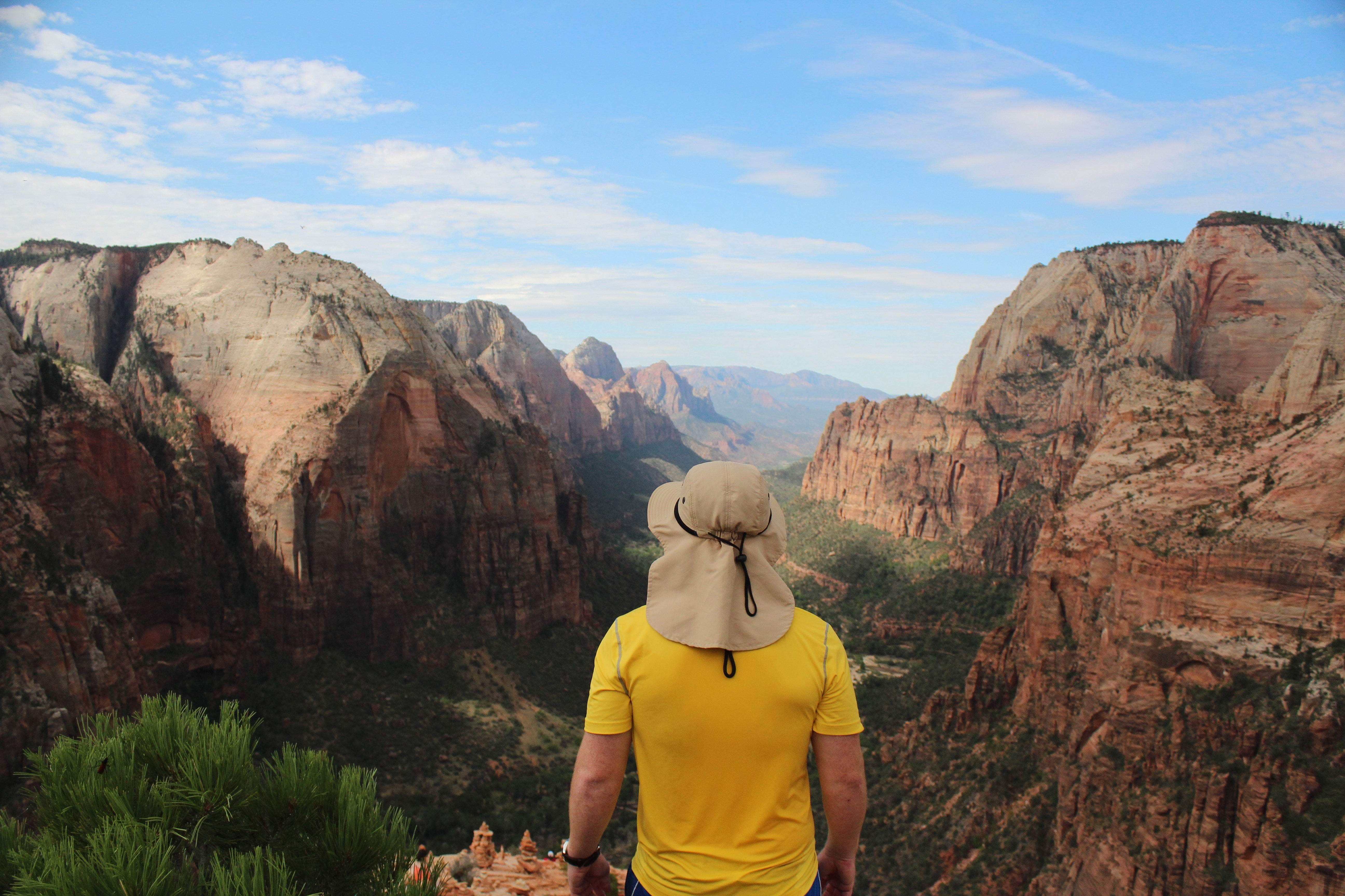 A person looking from top of mountains
