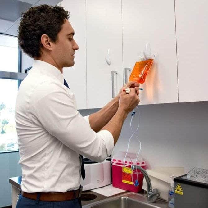 A man with medical IV bag